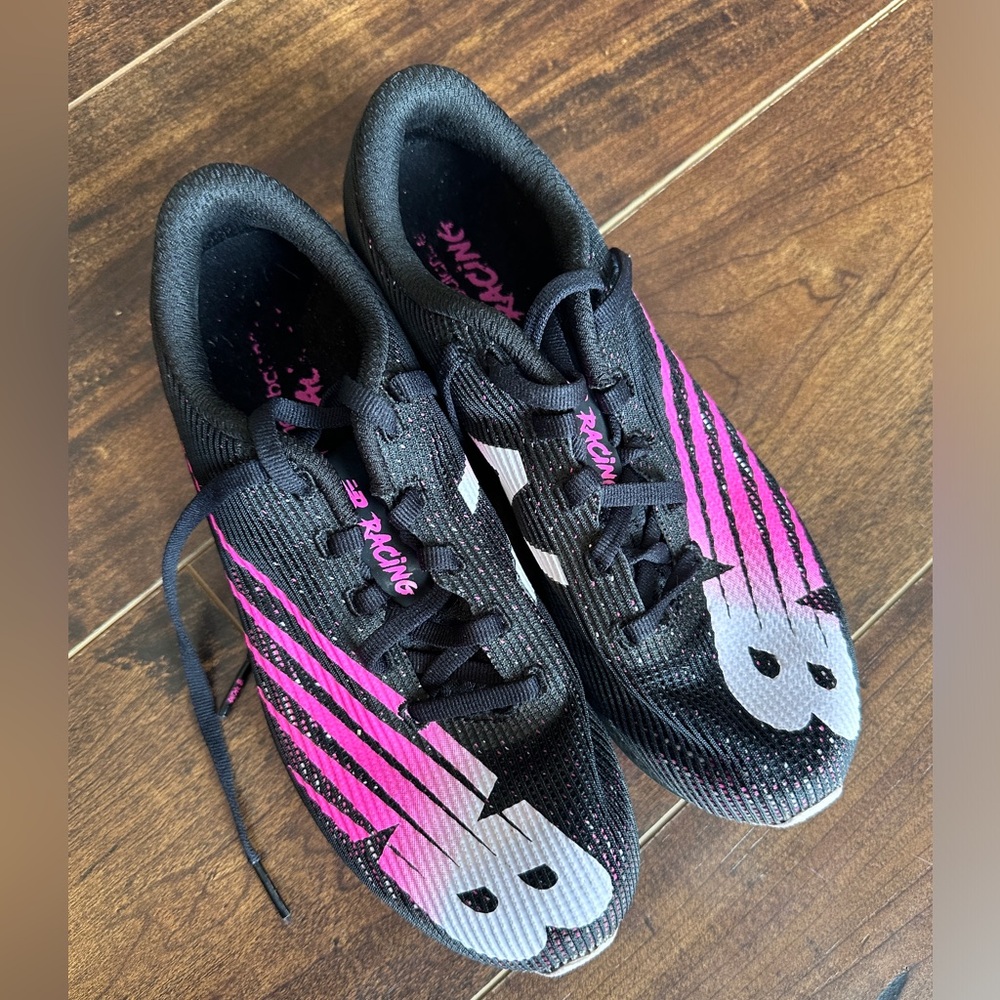 New Balance cross country spikes. Only used once. Excellent condition. Size 6.5